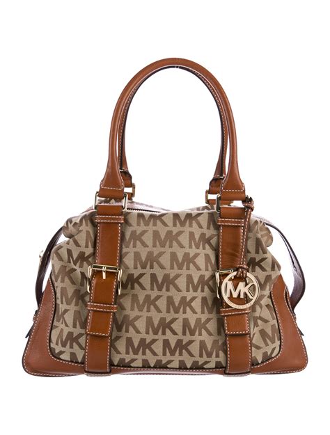 black monogram michael kors bag|Michael Kors monogram wallet.